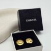 CHANEL - złote klipsy vintage z monogramem, lata 90.