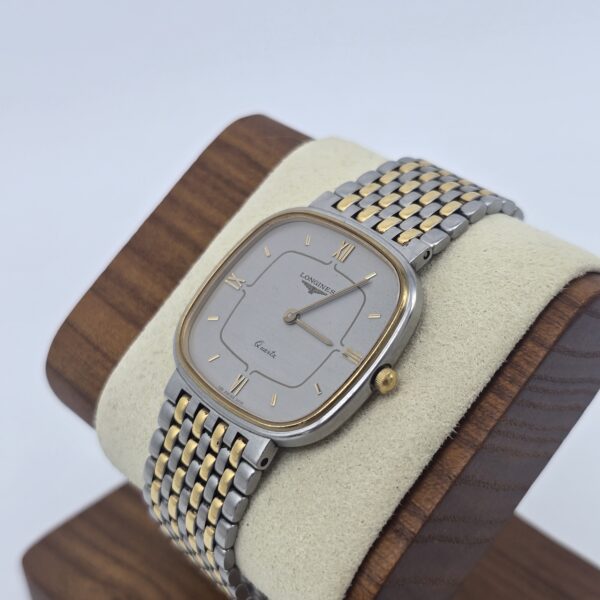 LONGINES - ozdobny zegarek vintage na bransolecie, lata 90. stojak