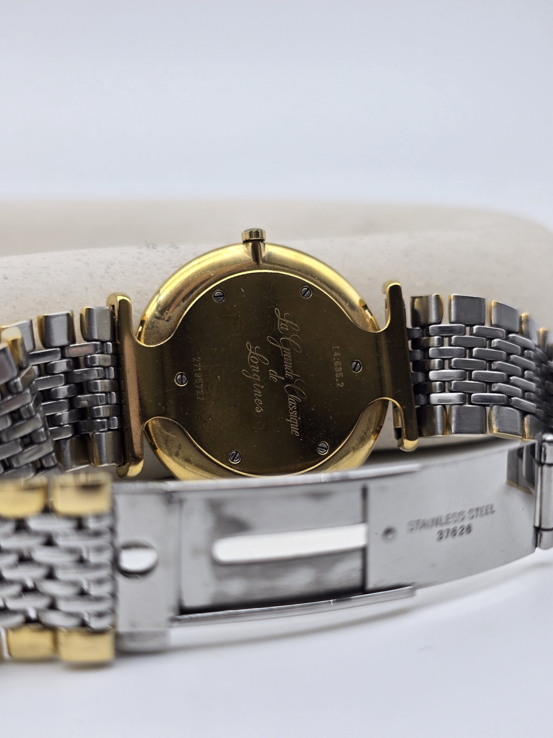 LONGINES - elegancki zegarek vintage z rzymskimi indeksami tył