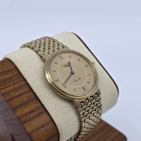 LONGINES - subtelny zegarek vintage na bransolecie stojak