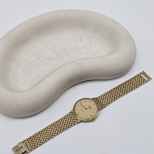 LONGINES - subtelny zegarek vintage na bransolecie front