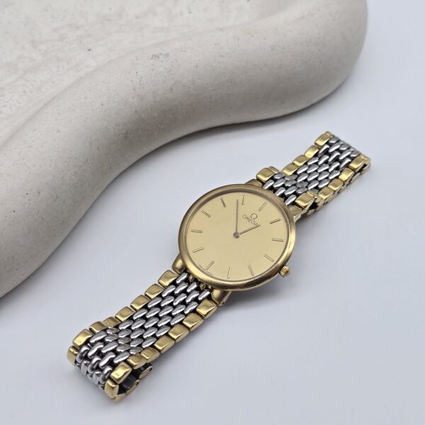 OMEGA De Ville - elegancki zegarek vintage na bransolecie z złotą tarczą front