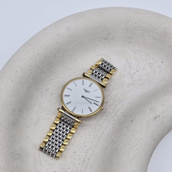 LONGINES - elegancki zegarek vintage z rzymskimi indeksami na podstawce
