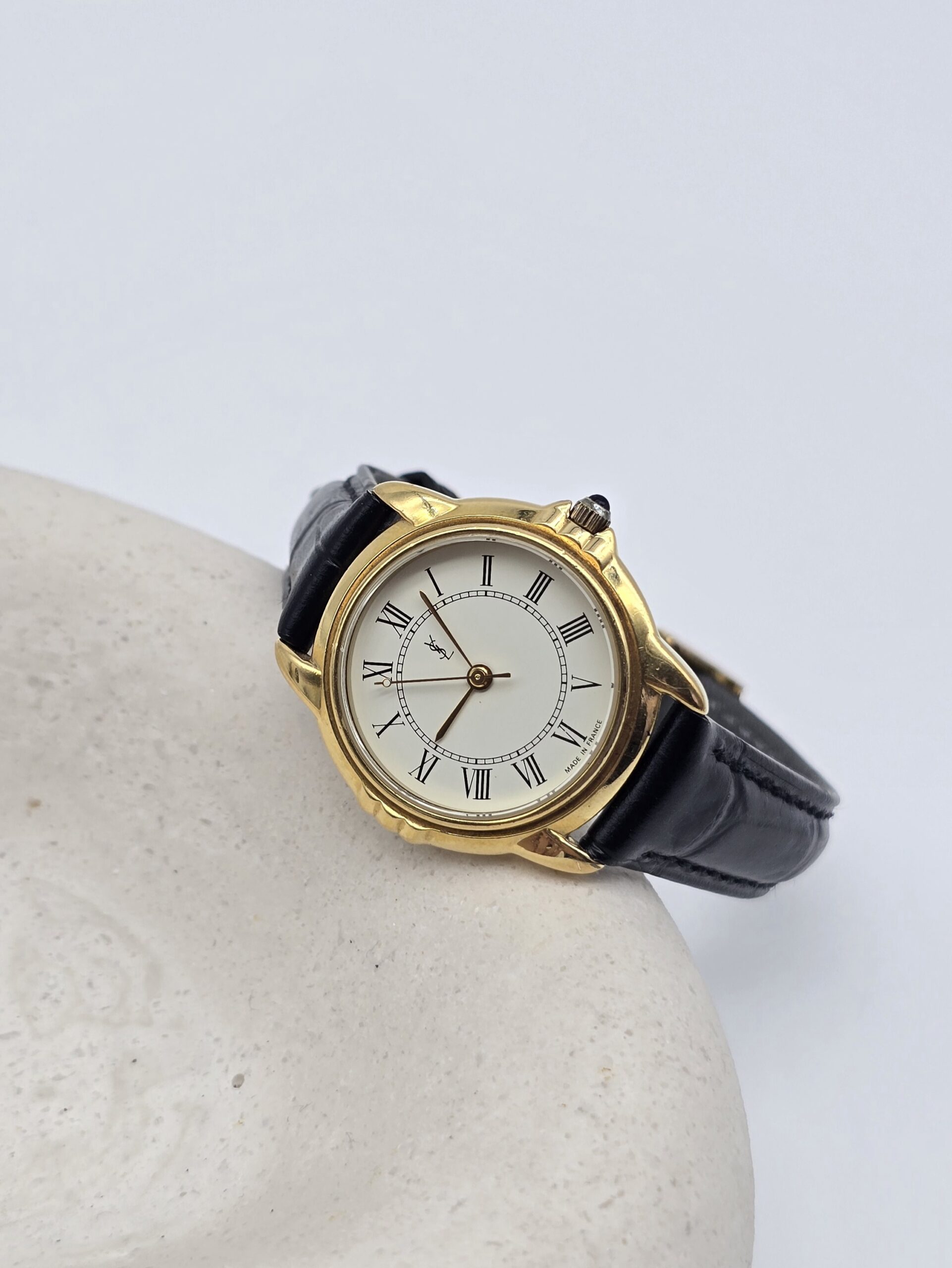 YVES SAINT LAURENT - klasyczny zegarek vintage z rzymskimi indeksami przód