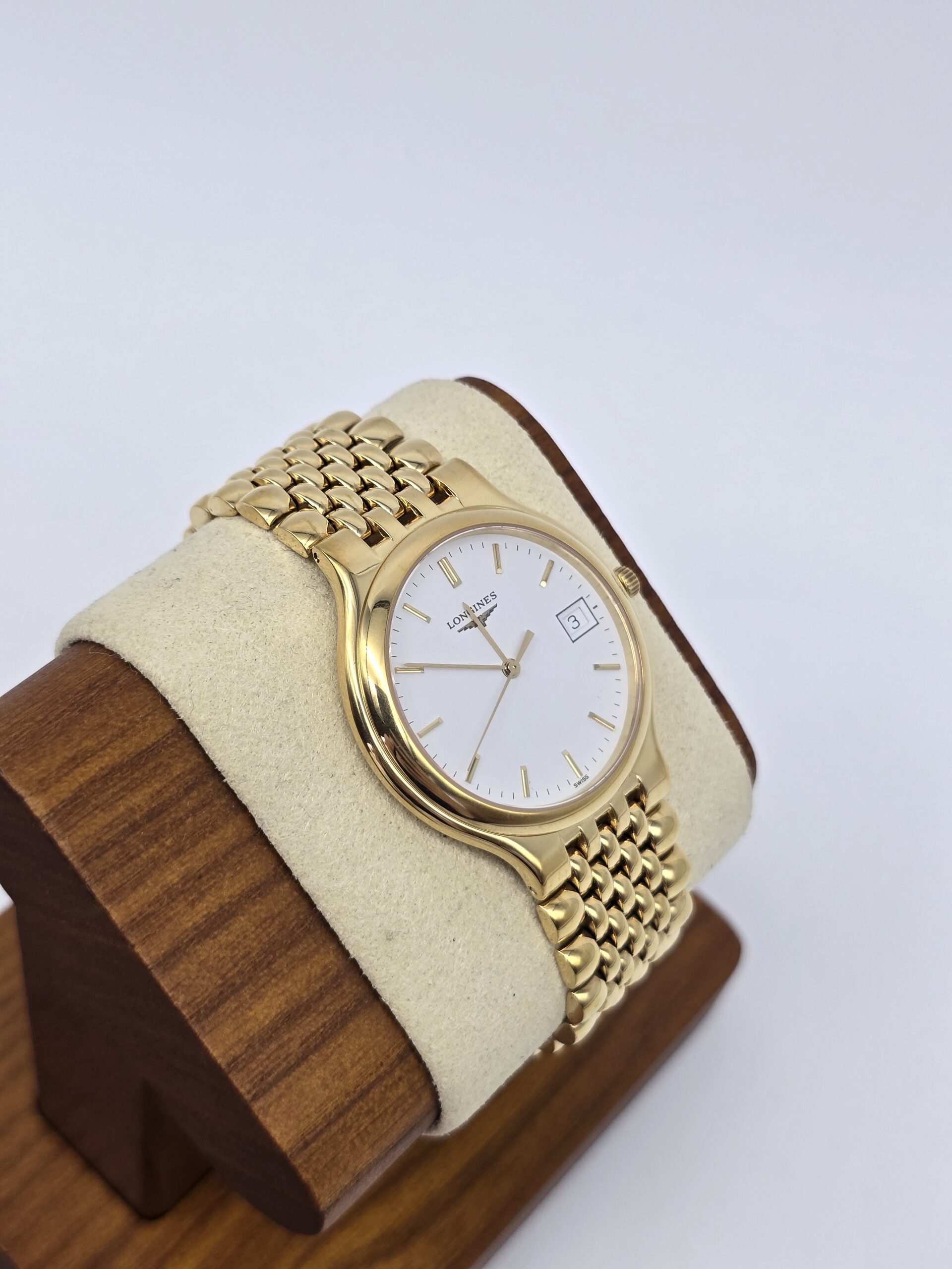 LONGINES Flagship - klasyczny zegarek vintage z datownikiem na stojaku