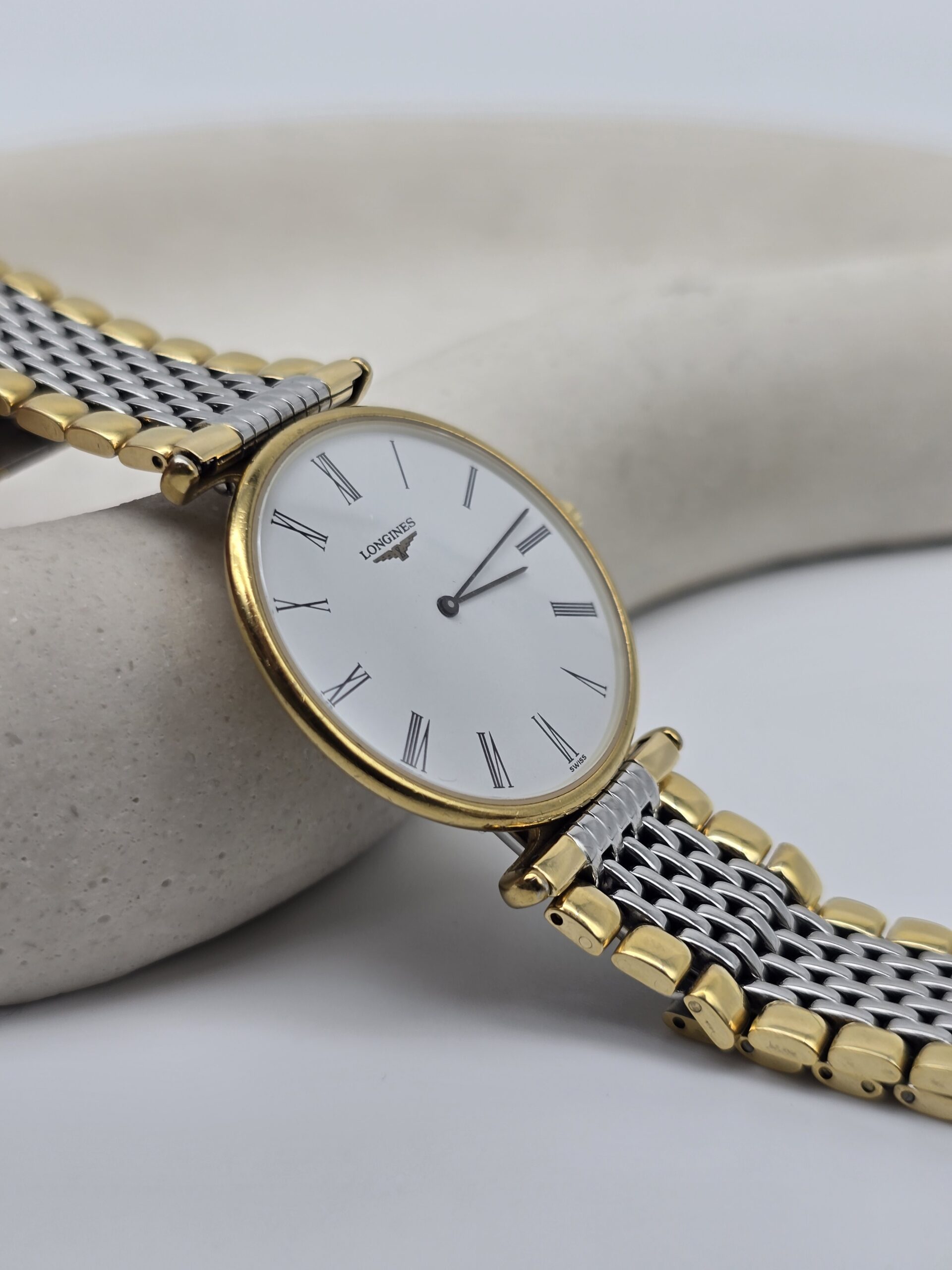 LONGINES - elegancki zegarek vintage z rzymskimi indeksami