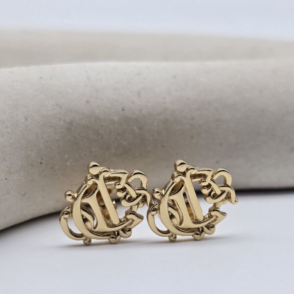 DIOR - złote klipsy vintage z monogramem