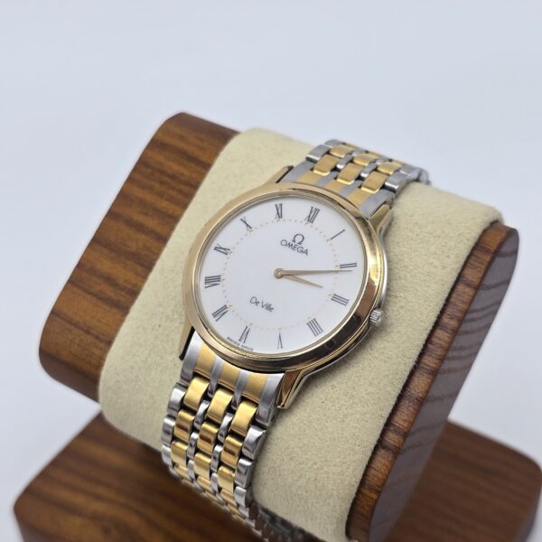OMEGA De Ville - klasyczny zegarek vintage z rzymskimi indeksami stojak