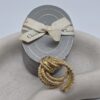 DIOR - elegancka broszka vintage z motywem plecionego sznura