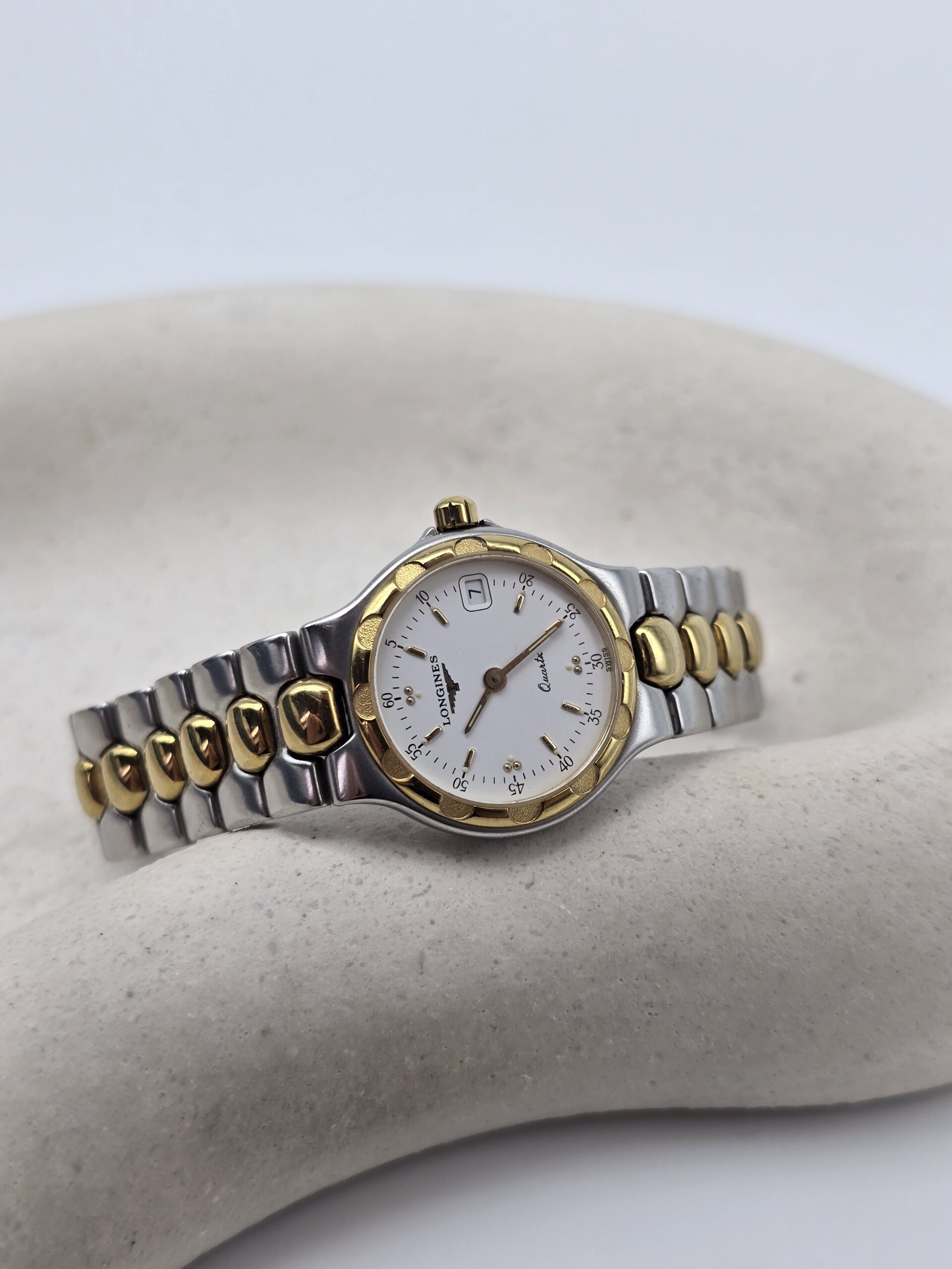 LONGINES Conquest - elegancki zegarek vintage na bransolecie