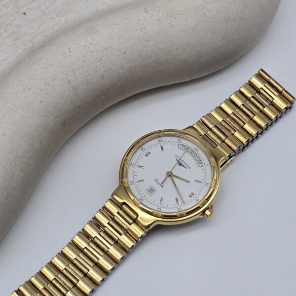 LONGINES Conquest - zegarek vintage na bransolecie z datownikiem front
