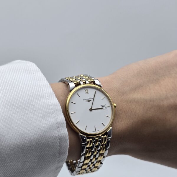 LONGINES La Grande Classique - elegancki zegarek vintage z datownikiem na sobie