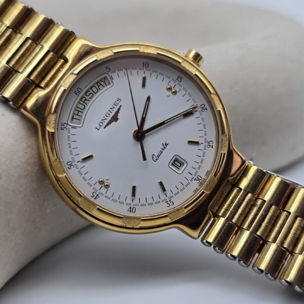 LONGINES Conquest - zegarek vintage na bransolecie z datownikiem