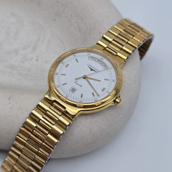 LONGINES Conquest - zegarek vintage na bransolecie z datownikiem koronka