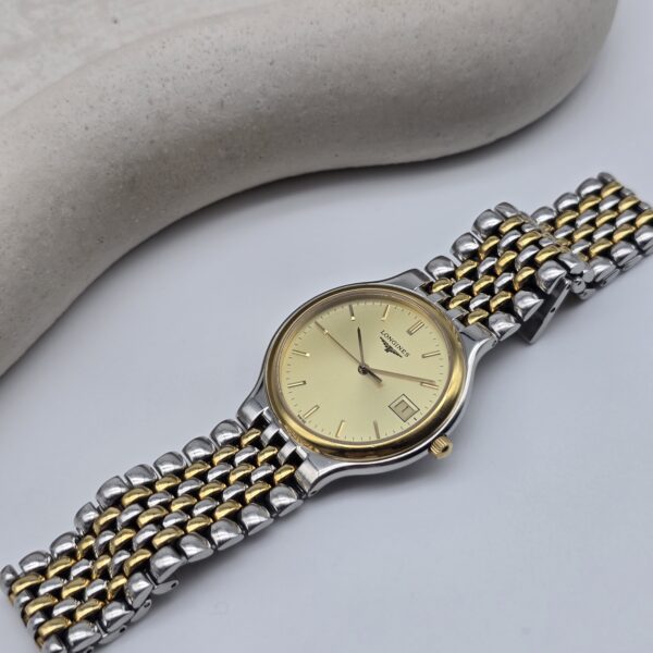 LONGINES - zegarek vintage na bransolecie z datownikiem fornt
